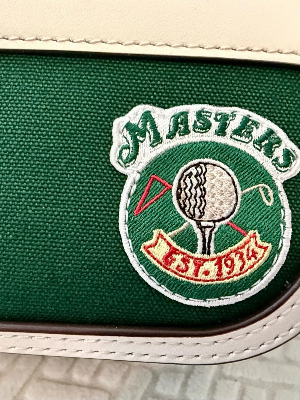 Masters Green and White Crossbody Bag by Tory Burch, and the Masters.